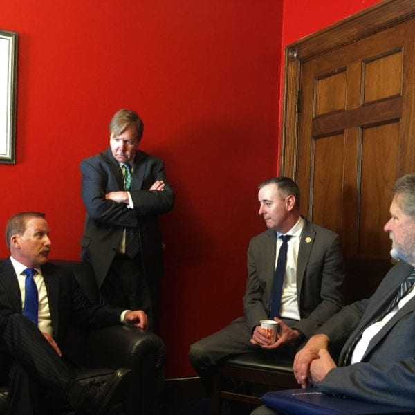 Fortress Power Goes to Washington 3 Men discussing clean energy initiatives